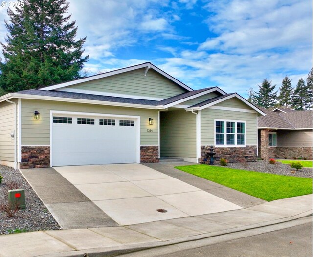 craftsman-style house featuring a garage