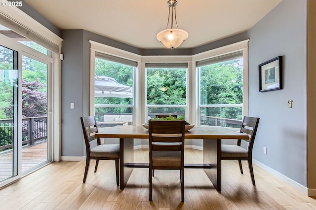 10445 SW 141st Ave, Beaverton, OR 97008 - dining space featuring light wood-style floors and baseboards