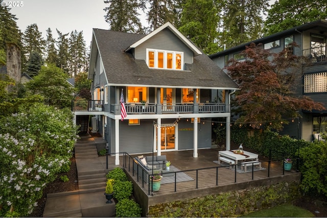 4047 Westbay Rd, Lake Oswego, OR 97035 - back of property with stairs, a balcony, a patio area, and roof with shingles
