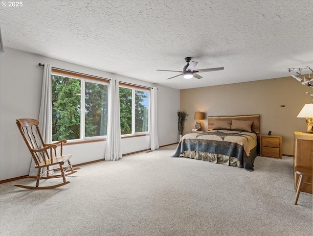 4415 Poplar Way, Longview, WA 98632 - bedroom featuring multiple windows, carpet floors, a textured ceiling, and ceiling fan