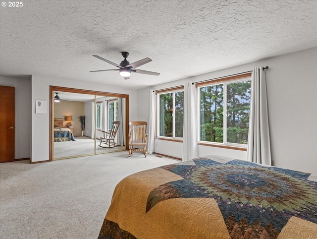 4415 Poplar Way, Longview, WA 98632 - bedroom featuring carpet floors, access to exterior, ceiling fan, and a textured ceiling