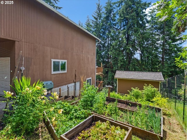 4415 Poplar Way, Longview, WA 98632 - view of yard with a garden and an outdoor structure