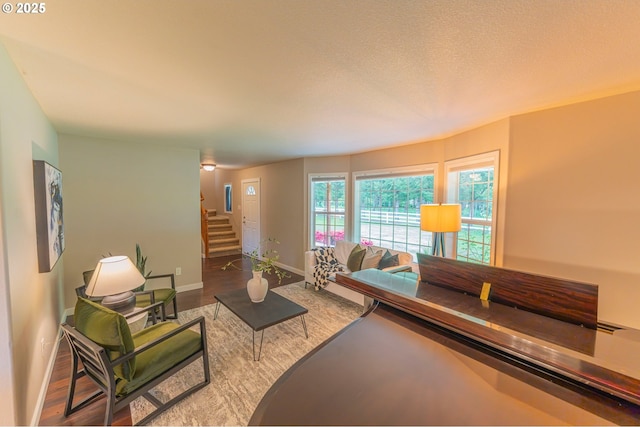 29115 NE 99th Ave, Battle Ground, WA 98604 - living room featuring stairs, wood finished floors, and baseboards