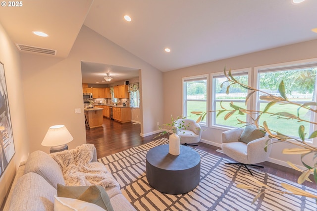 29115 NE 99th Ave, Battle Ground, WA 98604 - living area featuring dark wood-style floors, recessed lighting, baseboards, and high vaulted ceiling