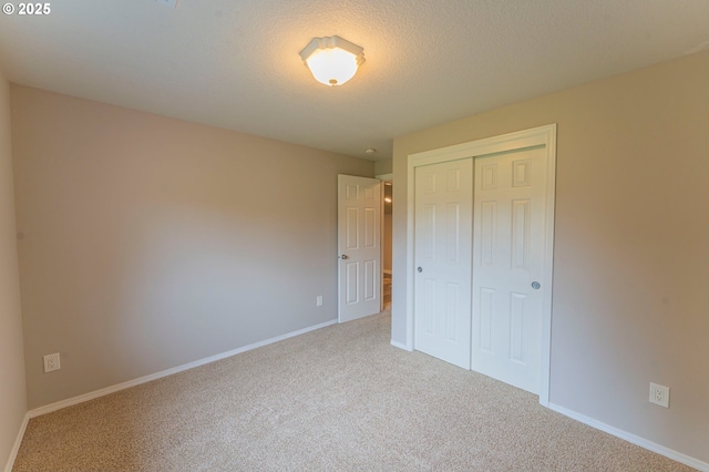 29115 NE 99th Ave, Battle Ground, WA 98604 - unfurnished bedroom featuring carpet, a closet, and baseboards