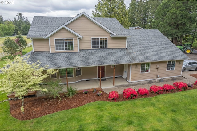 29115 NE 99th Ave, Battle Ground, WA 98604 - view of front facade with a shingled roof, a front lawn, and a patio