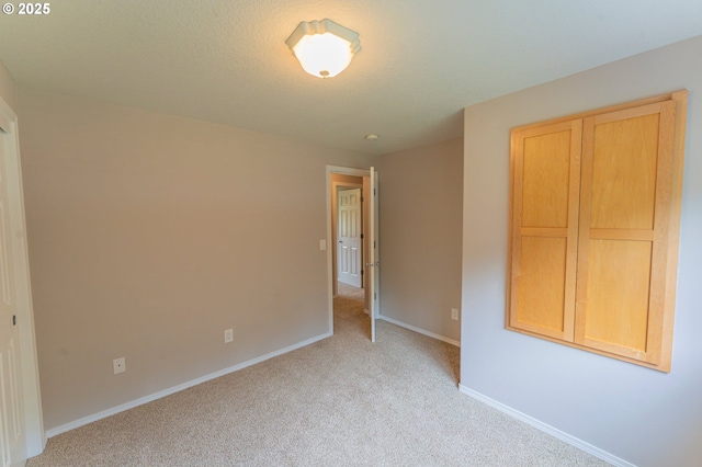 29115 NE 99th Ave, Battle Ground, WA 98604 - unfurnished bedroom featuring light colored carpet and baseboards