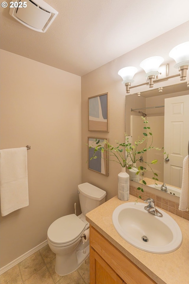 29115 NE 99th Ave, Battle Ground, WA 98604 - full bath with vanity, toilet, a shower with shower curtain, tile patterned flooring, and baseboards
