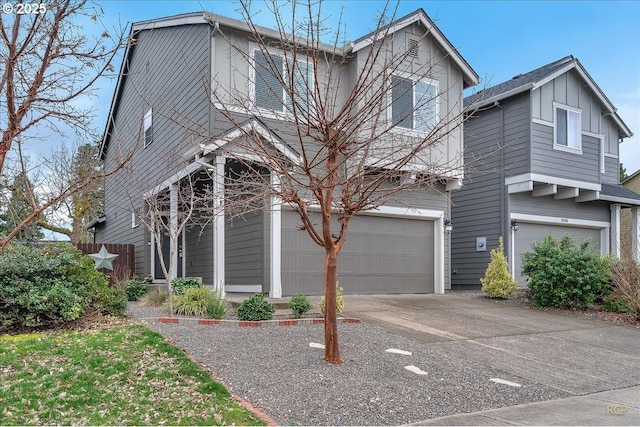 view of front of home featuring an attached garage, driveway, and board and batten siding