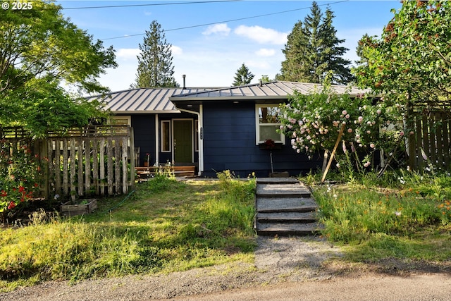 2941 SW Moss St, Portland, OR 97219 - view of front of property featuring a standing seam roof and metal roof