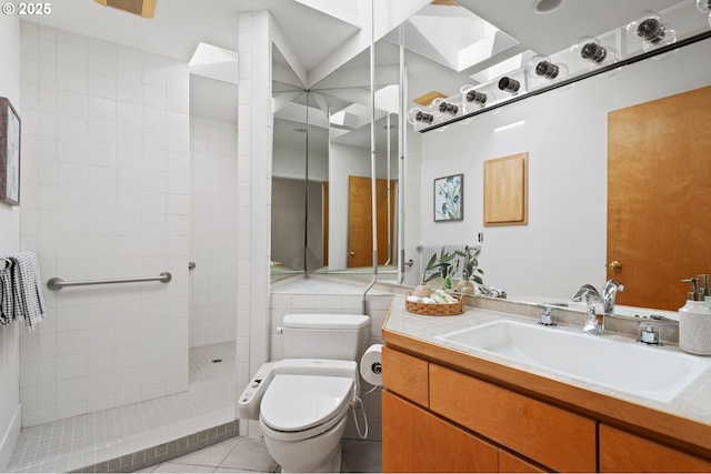 2941 SW Moss St, Portland, OR 97219 - bathroom featuring toilet, vanity, a walk in shower, and tile patterned flooring