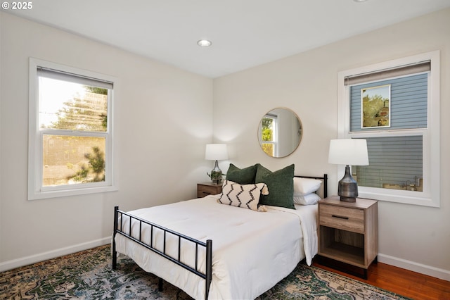 2941 SW Moss St, Portland, OR 97219 - bedroom featuring baseboards, recessed lighting, and wood finished floors