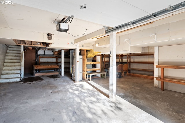2941 SW Moss St, Portland, OR 97219 - garage featuring gas water heater and a garage door opener
