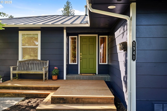 2941 SW Moss St, Portland, OR 97219 - view of exterior entry with metal roof and a standing seam roof