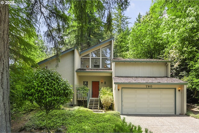 2 Icarus Loop, Lake Oswego, OR 97035 - mid-century modern home featuring driveway and an attached garage