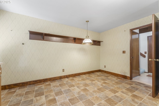 2 Icarus Loop, Lake Oswego, OR 97035 - spare room featuring light stone finish flooring and wallpapered walls