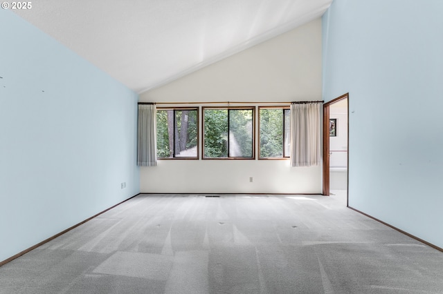 2 Icarus Loop, Lake Oswego, OR 97035 - carpeted empty room with high vaulted ceiling
