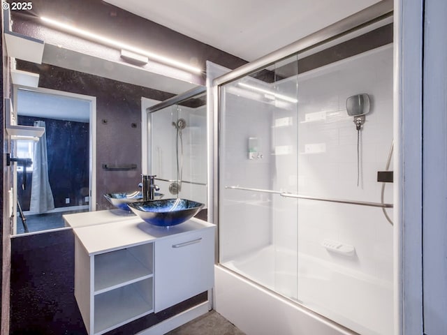 full bathroom with vanity and shower / bath combination with glass door