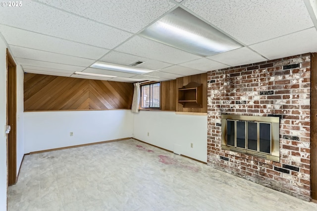 13230 SW Hill Ct, Portland, OR 97223 - below grade area with baseboards, a drop ceiling, and visible vents