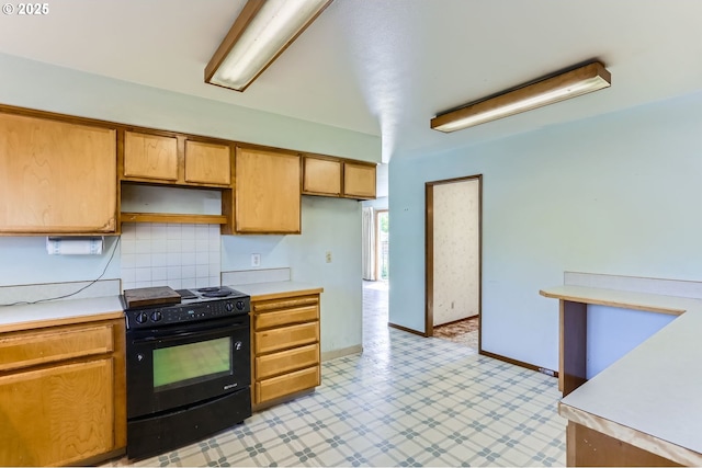 13230 SW Hill Ct, Portland, OR 97223 - kitchen featuring light countertops, light floors, black range, and baseboards