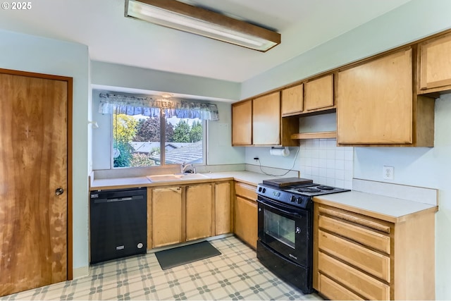 13230 SW Hill Ct, Portland, OR 97223 - kitchen featuring light countertops, light floors, black appliances, and a sink