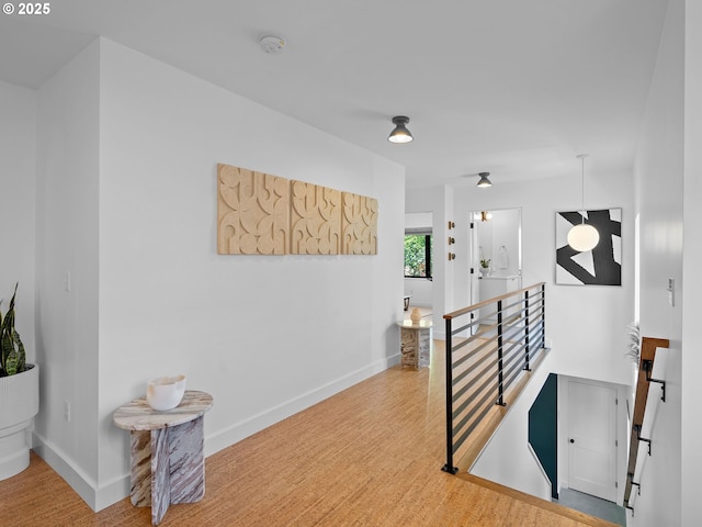 4566 NE Cesar E Chavez Blvd, Portland, OR 97211 - hallway with an upstairs landing and wood finished floors