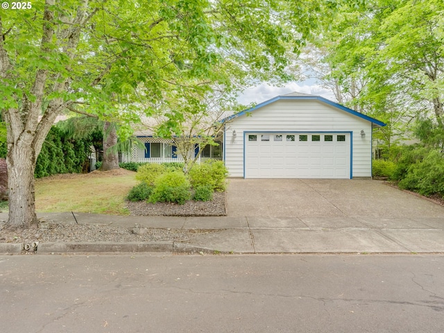 ranch-style home with concrete driveway