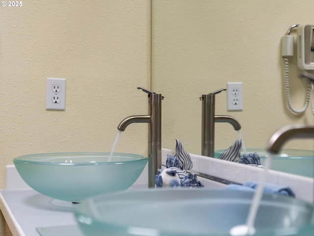 bathroom view of a textured wall and a sink