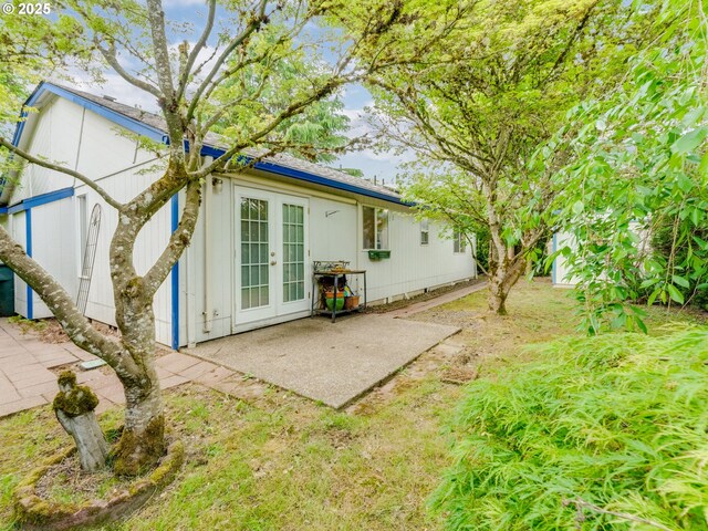 1761 SW Songbird St, Mcminnville, OR 97128 - rear view of house with french doors and a patio
