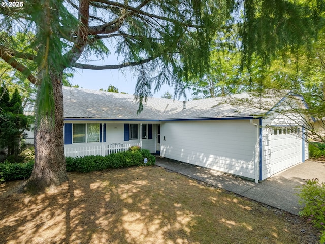 1761 SW Songbird St, Mcminnville, OR 97128 - single story home with a garage, roof with shingles, and asphalt driveway