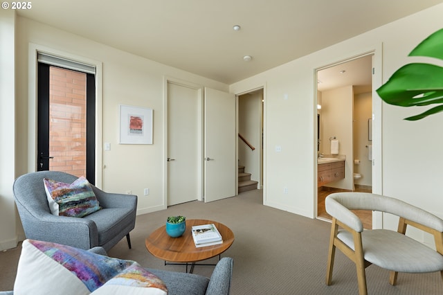 1660 NW Riverscape Dr, Portland, OR 97209 - living room with carpet floors and stairs