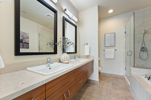 1660 NW Riverscape Dr, Portland, OR 97209 - bathroom featuring double vanity, a shower stall, a bath, and recessed lighting