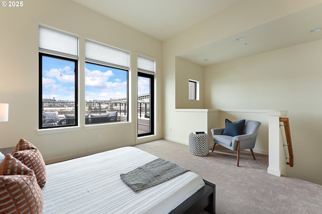 1660 NW Riverscape Dr, Portland, OR 97209 - bedroom with carpet floors and access to exterior