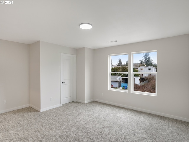 view of carpeted spare room