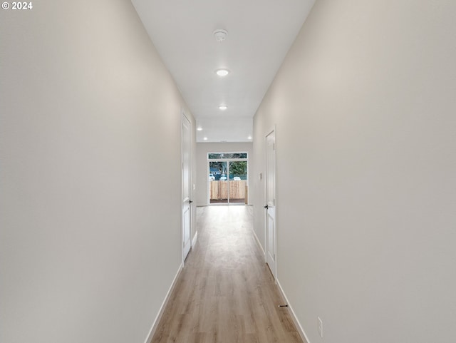 hallway featuring light wood-type flooring