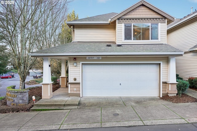 view of front of property featuring a garage