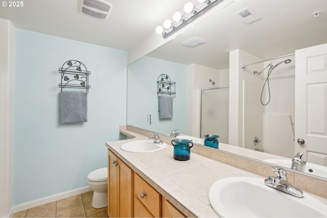 full bathroom with tile patterned flooring, vanity, shower / tub combination, and toilet