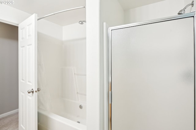 bathroom with shower / tub combination