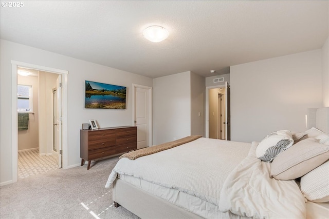456 Cornwell St, Woodburn, OR 97071 - bedroom with light carpet and connected bathroom