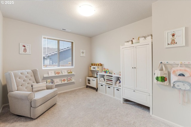 456 Cornwell St, Woodburn, OR 97071 - sitting room featuring carpet floors and a textured ceiling