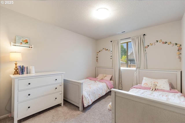 456 Cornwell St, Woodburn, OR 97071 - bedroom featuring light colored carpet and a textured ceiling
