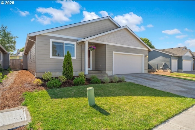 456 Cornwell St, Woodburn, OR 97071 - ranch-style home featuring a garage and concrete driveway