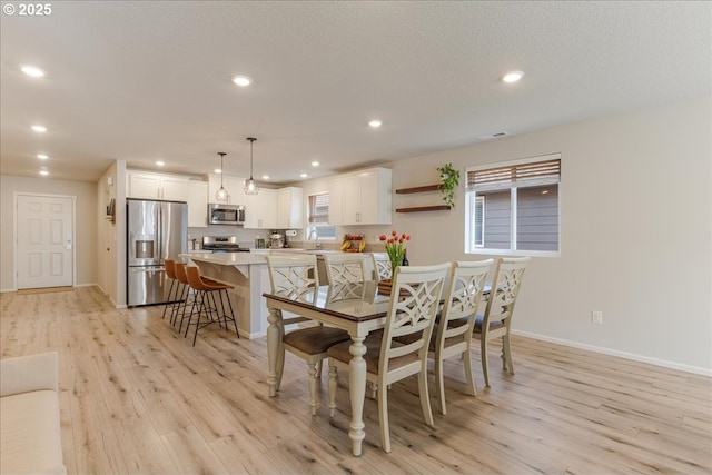 456 Cornwell St, Woodburn, OR 97071 - dining room featuring light wood-style flooring and recessed lighting