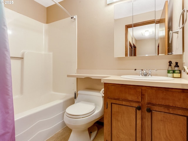 full bathroom featuring shower / bath combo, vanity, and toilet