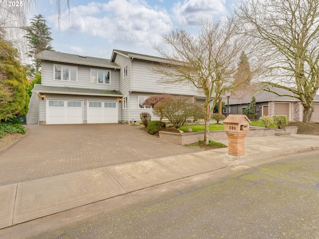 view of front of home with a garage