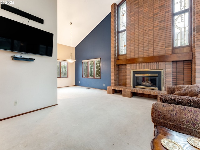 carpeted living area featuring high vaulted ceiling, a brick fireplace, and baseboards