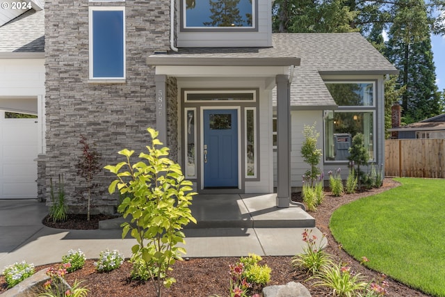 5826 SW Grayson Ter, Beaverton, OR 97078 - view of exterior entry with a shingled roof