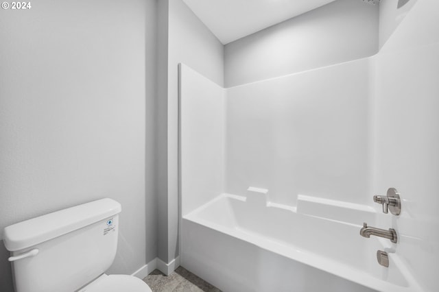 5826 SW Grayson Ter, Beaverton, OR 97078 - bathroom featuring toilet, baseboards, and tub / shower combination
