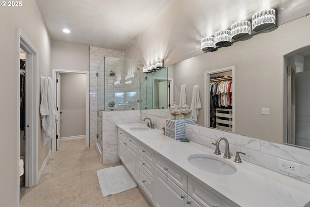 bathroom with vanity and an enclosed shower