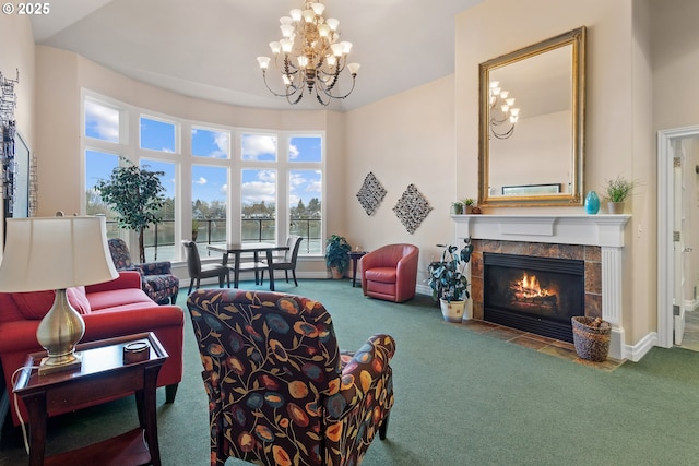 carpeted living room featuring an inviting chandelier, a fireplace, and a high ceiling